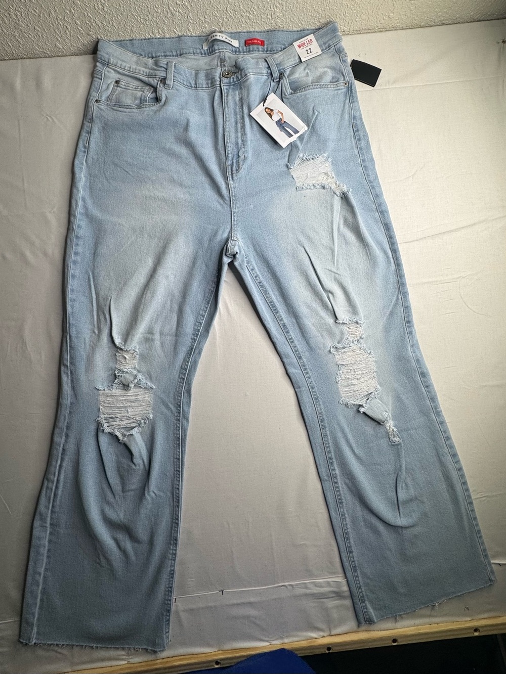 Celebrity Pink Light Blue Distressed Flare Jeans